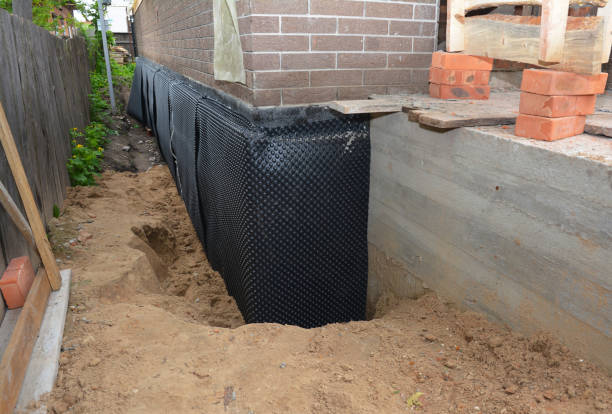 SJ Waterproofing Pros technician performing targeted Waterproofing assessment in Thorndale, PA